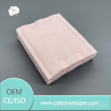 Pink edge-pressed square cotton pads